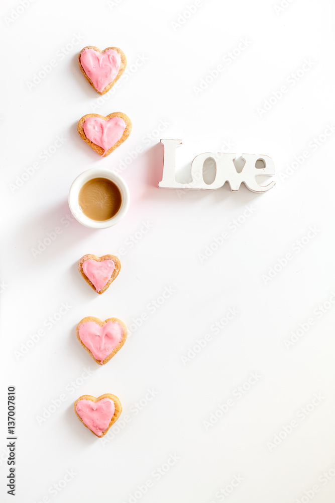 cookies for Valentine Day heartshaped white background top view pattern