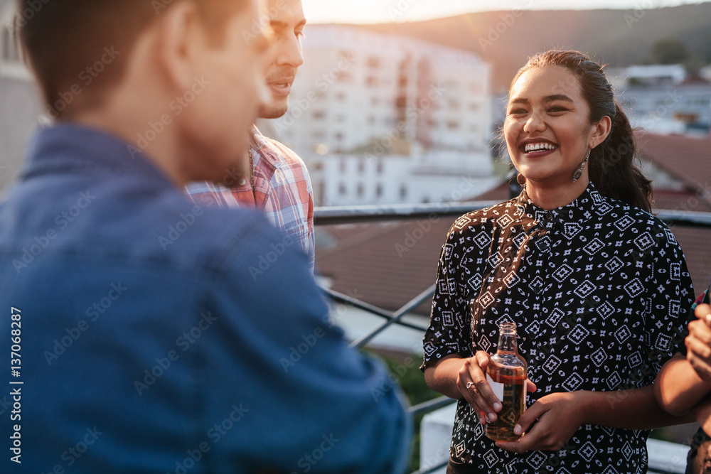 People having good time at rooftop party