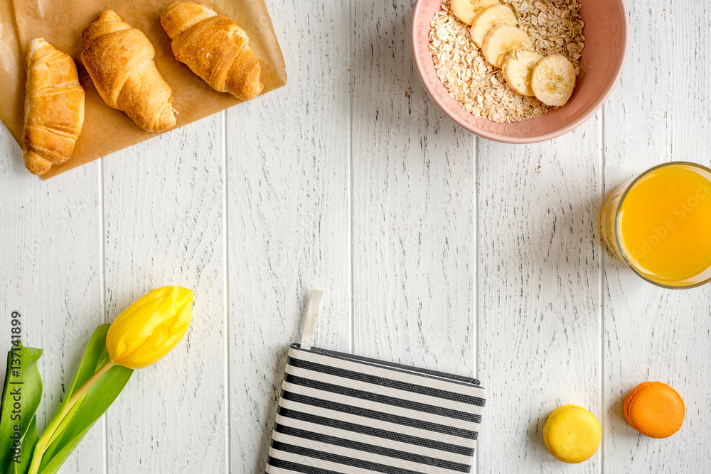 healthy breakfast with porridge on wooden background top view