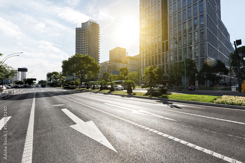 traffic on road in midtown of modern city