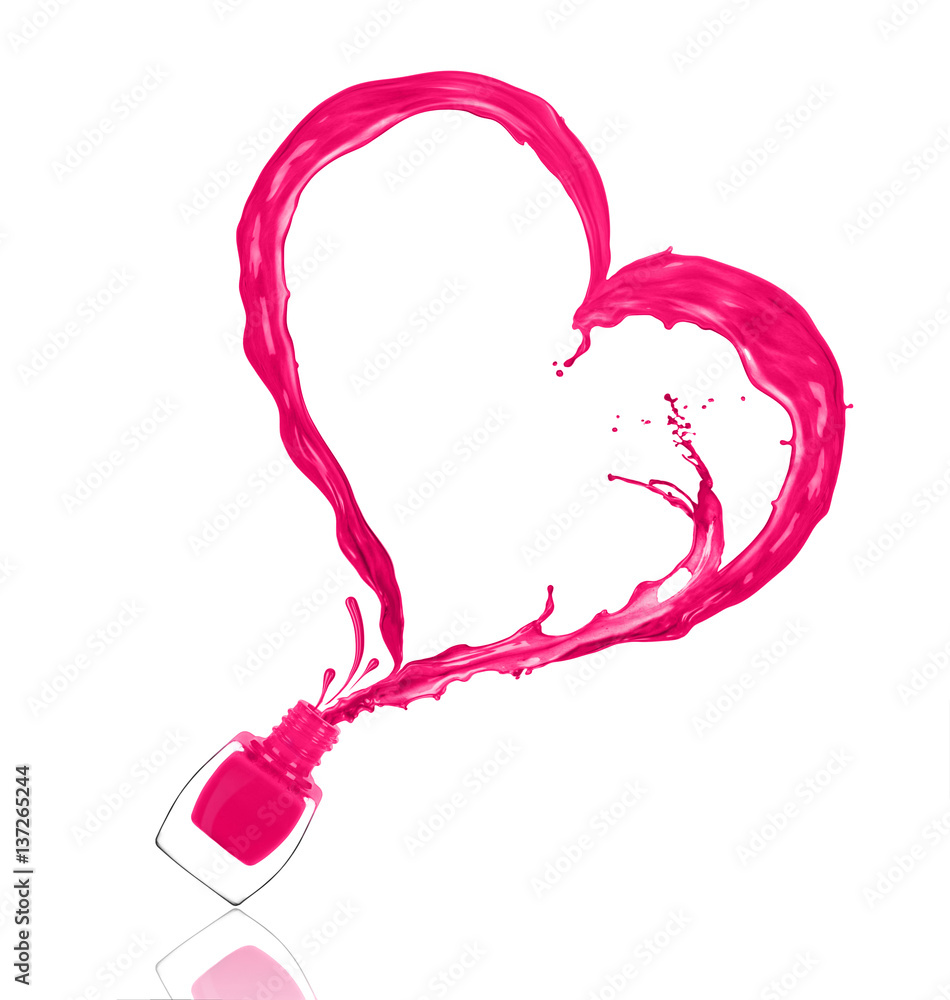 Splash of nail polish in the shape of a heart, poured from the bottle on white background