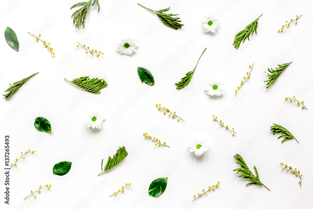 Froral pattern on white table background top view mockup