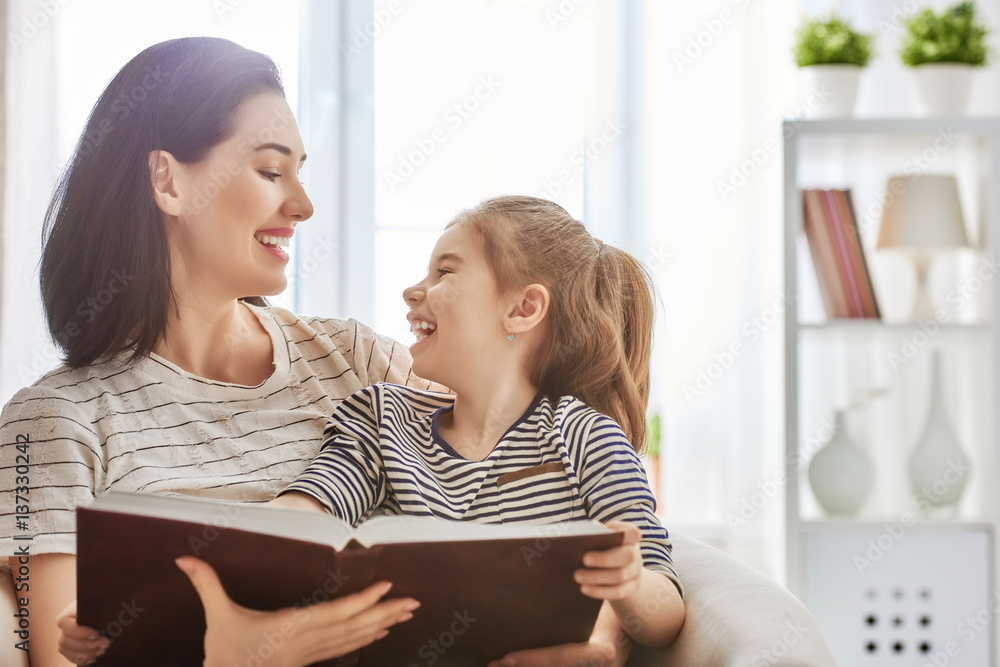 Mom and child reading a book