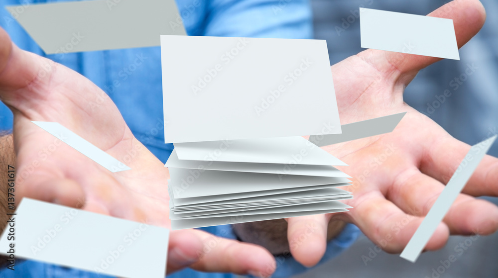 Businessman holding floating business card 3D rendering