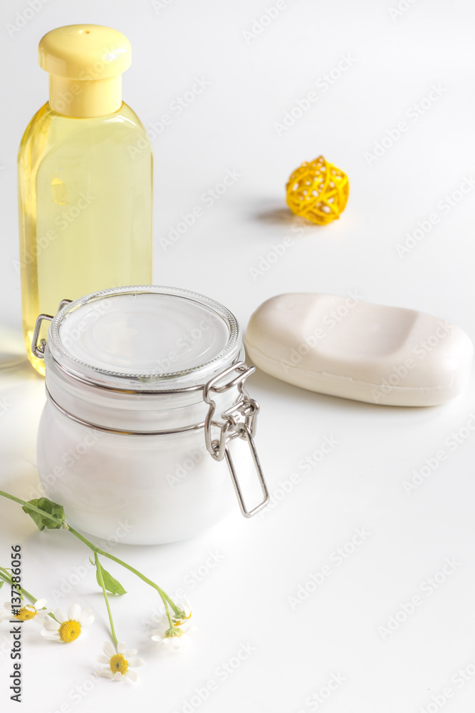 natural organic cosmetics with herbs for baby on white background