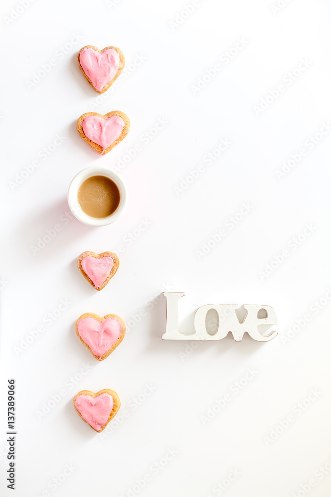 cookies for Valentine Day heartshaped white background top view pattern