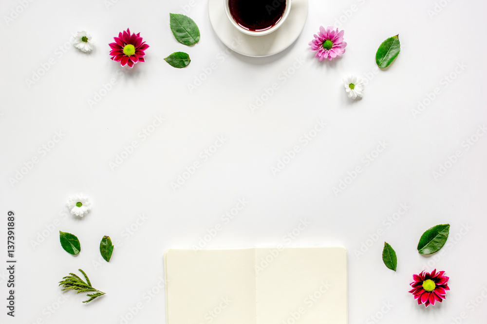 Copybook, americano and flowers on white table top view mock-up