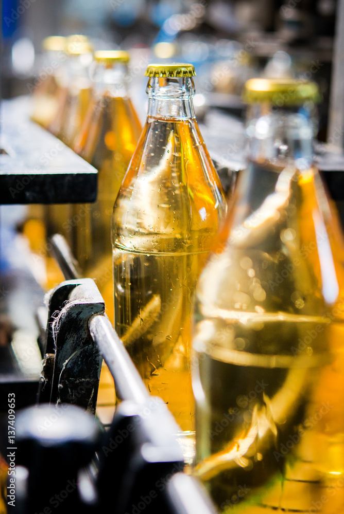 Filling bottles with juice