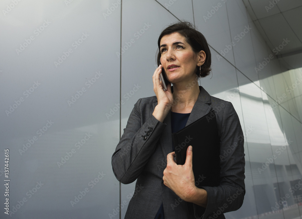 Businesswoman Talking Using Phone Working Busy