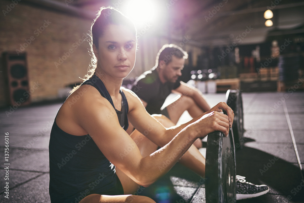 Young sportsmen having rest afret hard workout