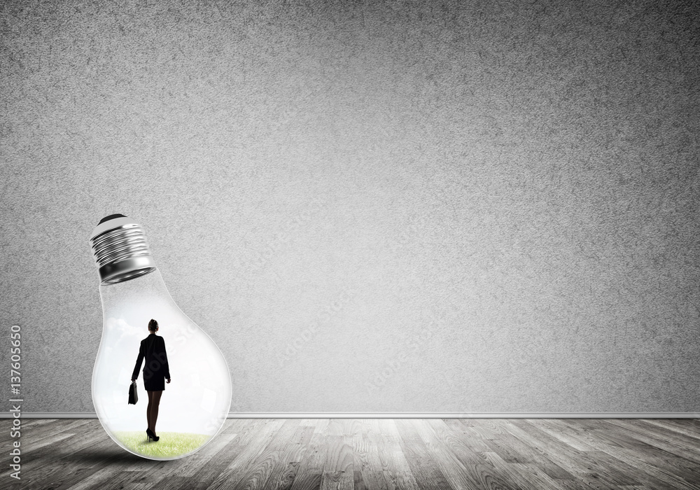 Businesswoman trapped in bulb