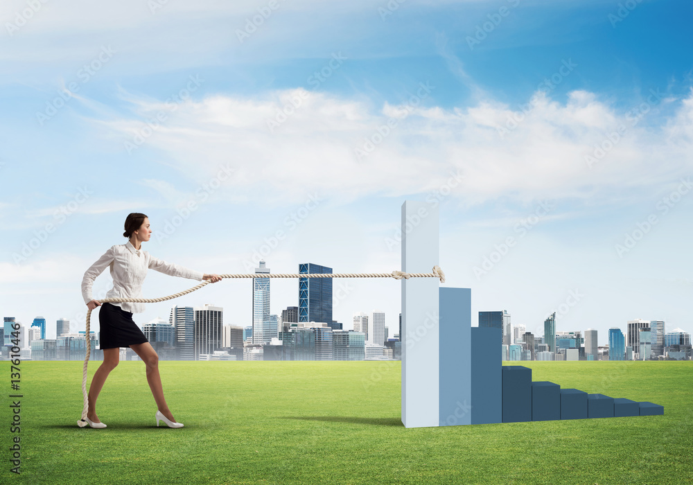 Businesswoman pulling arrow with rope and making it raise up