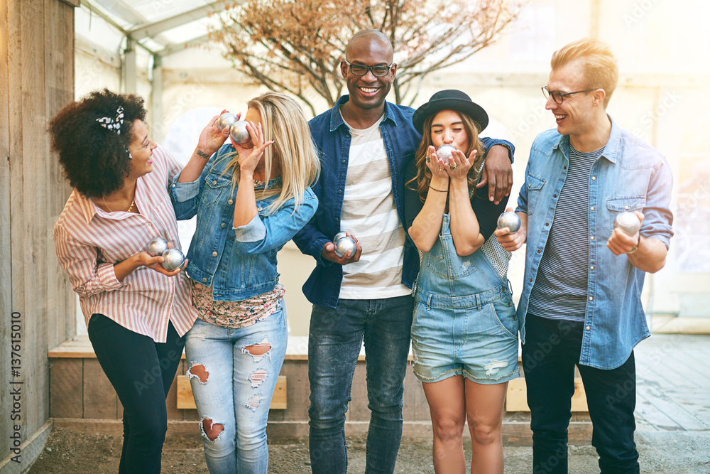 Young people in petanque game center