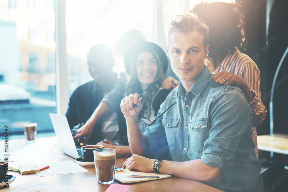 Young entrepreneurs in cafe or office