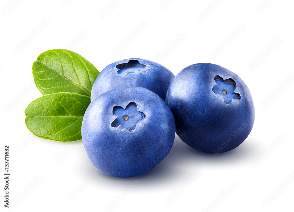 Three blueberries. Berry isolated with leaves isolated on white background. Clipping path. Close up.