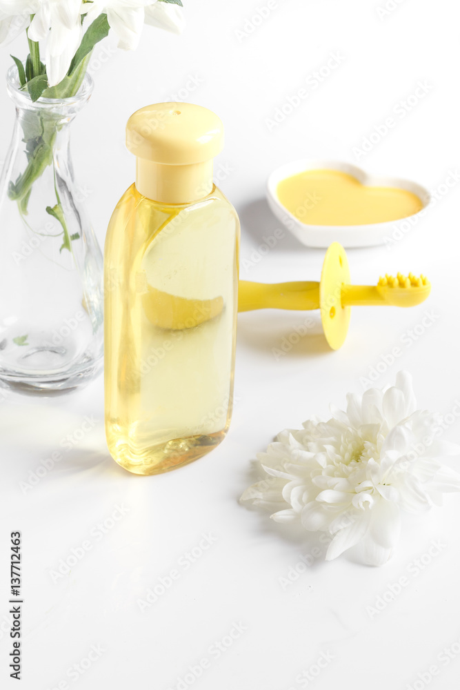 natural organic cosmetics with herbs for baby on white background