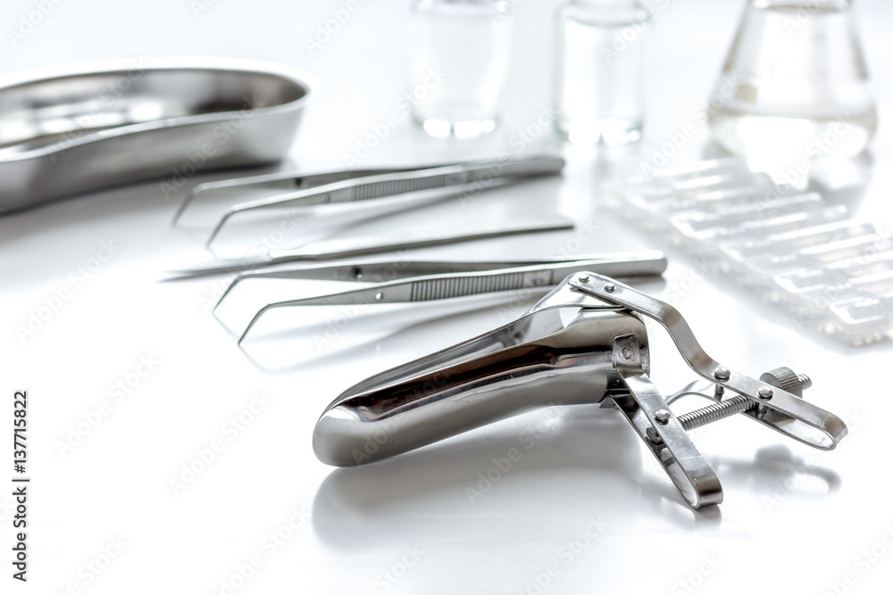 instruments of gynecologist on white background