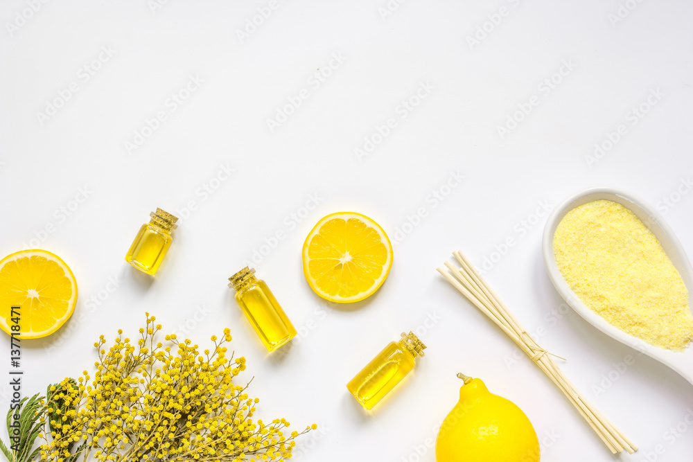 Natural cosmetic seasalt and oil on white background top view mock up