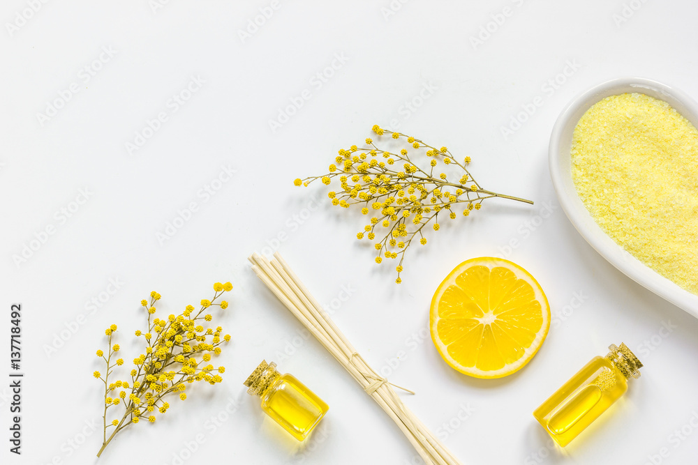 Yellow cosmetic set for body care on white background top view