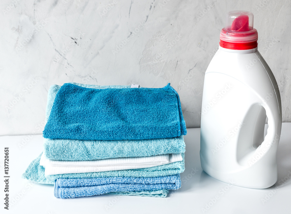 Towels pile in housekeeping set on laudry background mock up