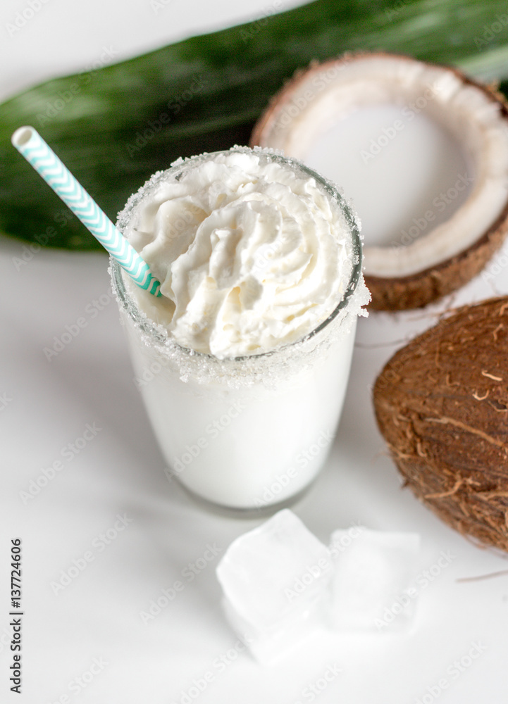 cocktail with coconut on white background