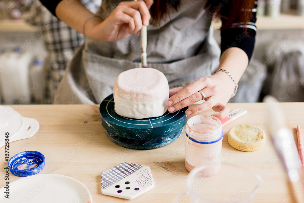 workshop production of ceramic tableware product painting