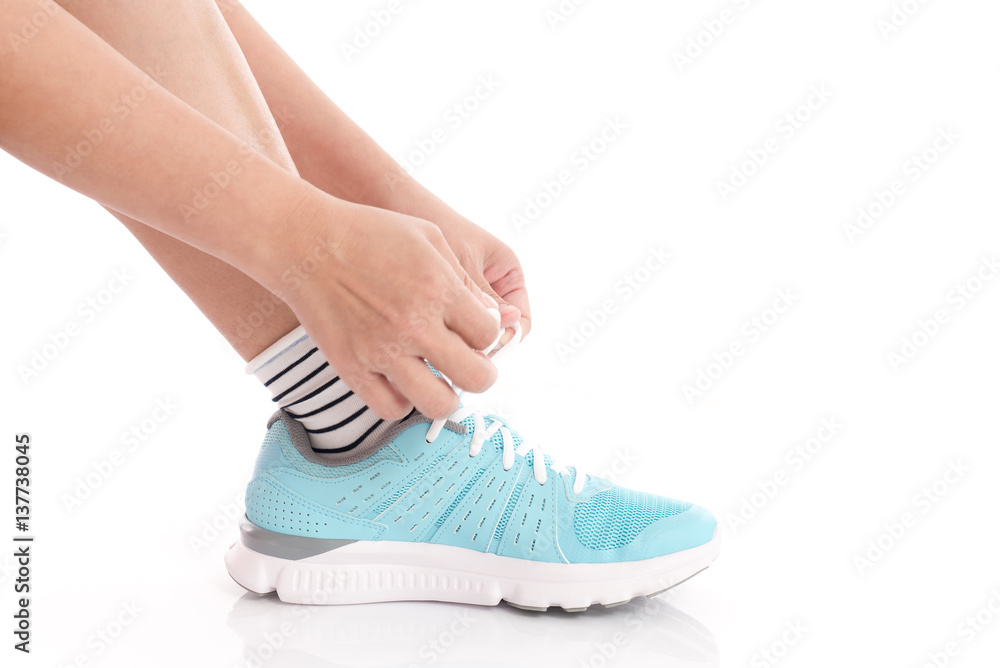  woman tying shoelaces