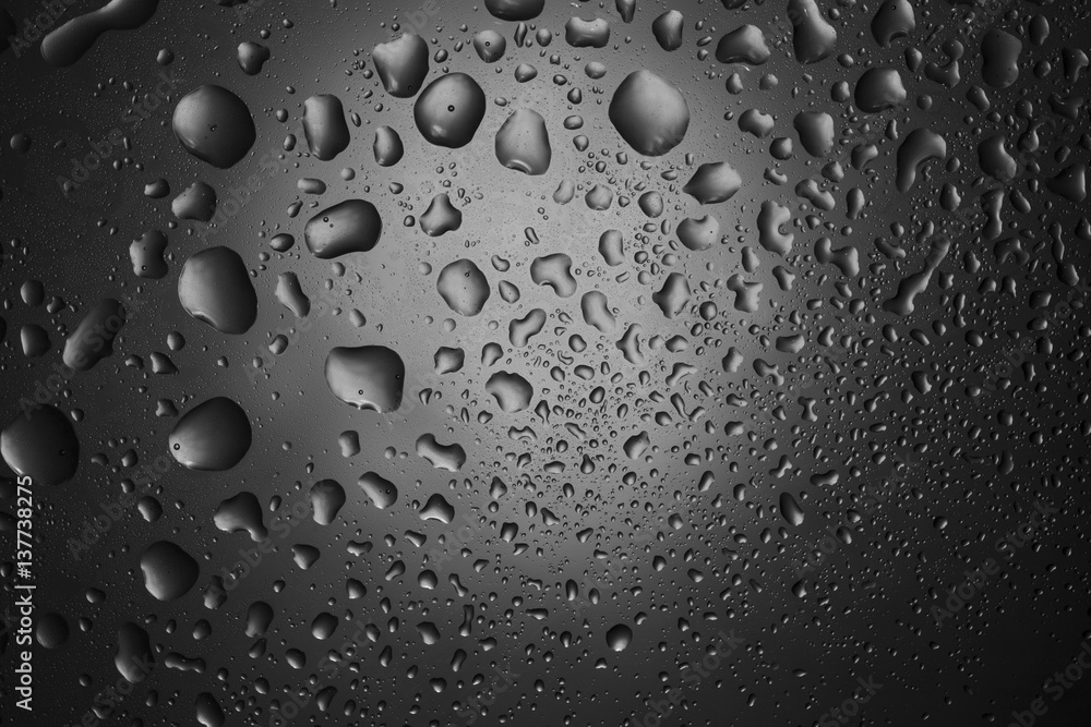 Water drops on glass for background and design.