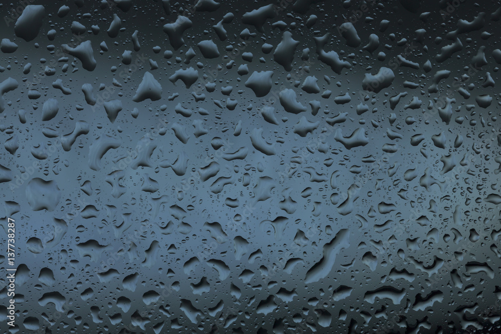 Water drops on glass for background and design.