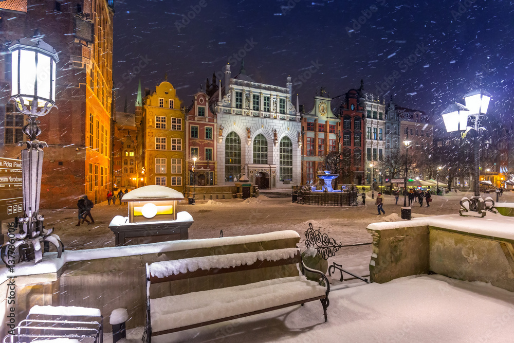 Long lane in the old town of Gdansk in snowy winter, Poland