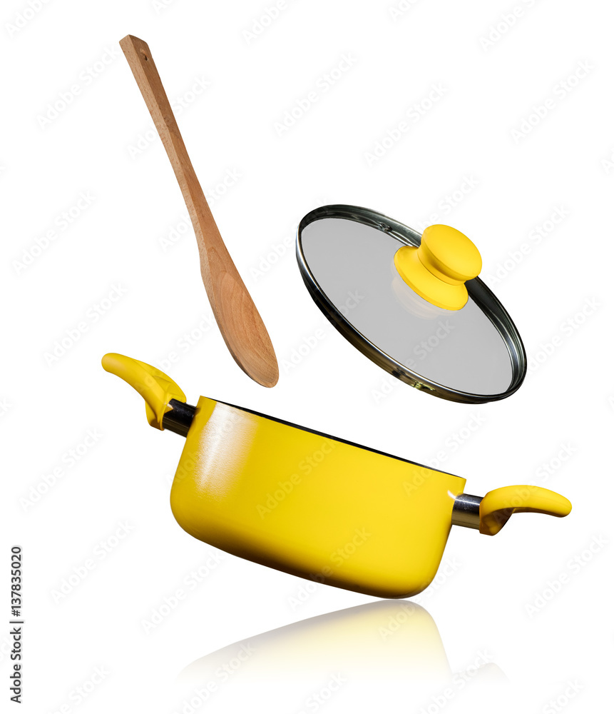 Empty kitchen pot with flying lid and spoon