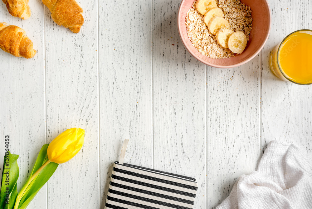 healthy breakfast with porridge on wooden background top view