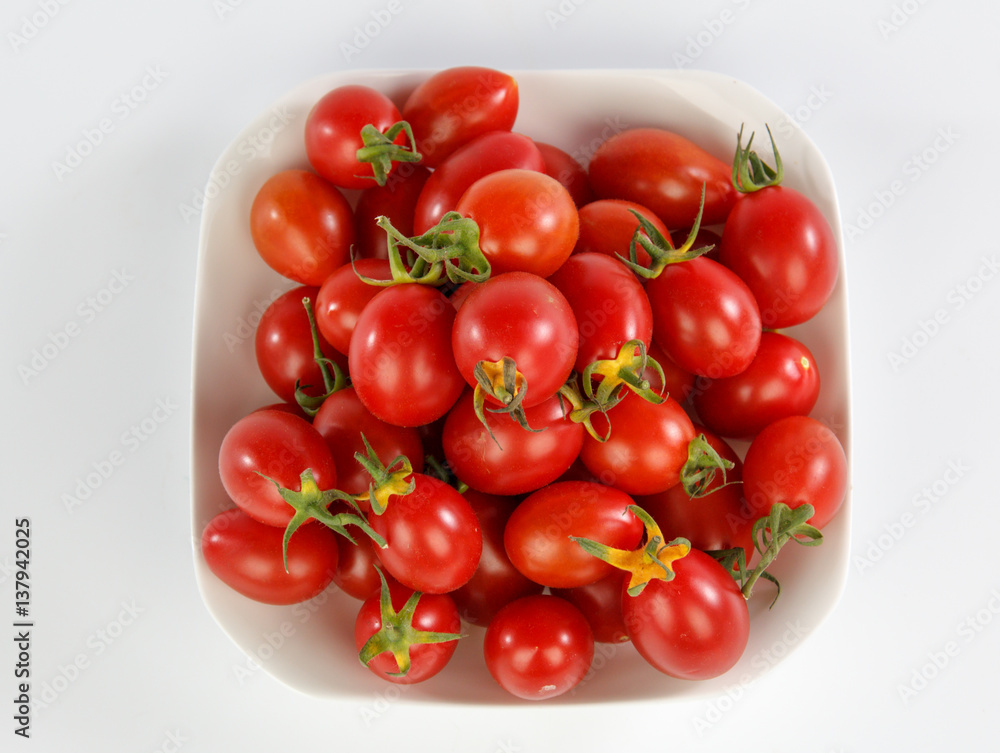 tomatoes on a white plate