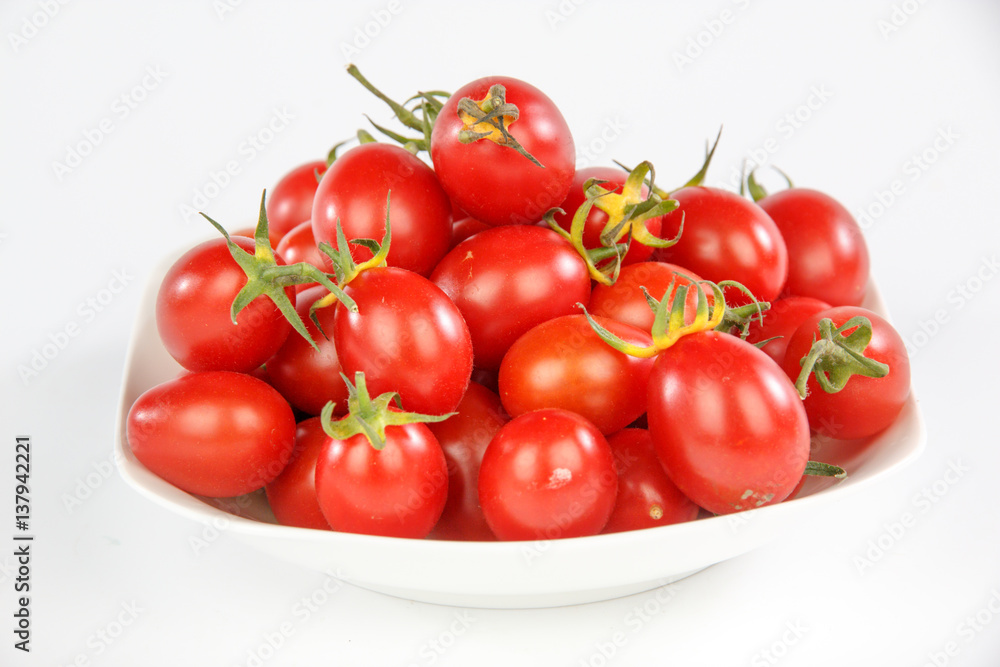 tomatoes on a white plate