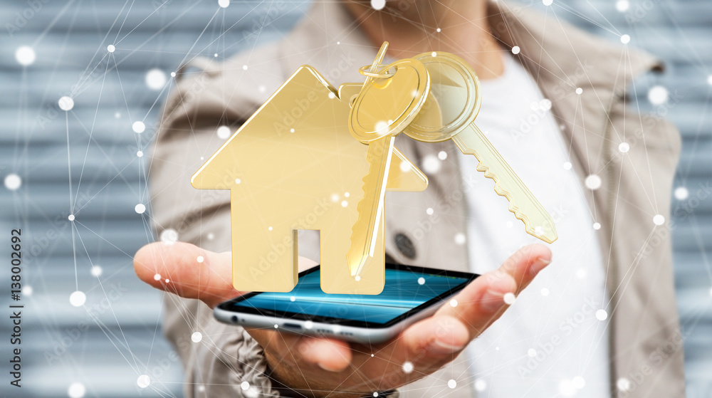 Businessman holding key with house keyring over phone 3D rendering