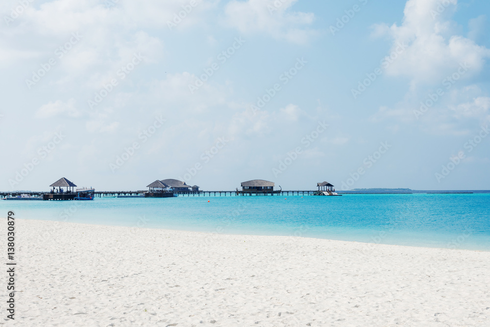 beautiful tranquil beach in blue sunny sky