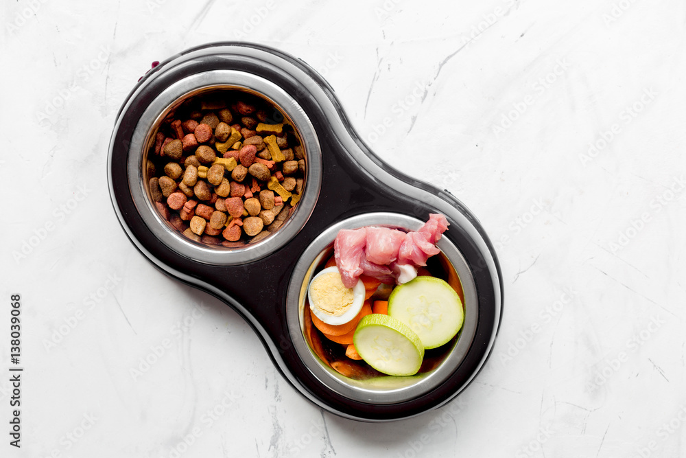 Vegetables and petfood on kitchen table background top view mock up