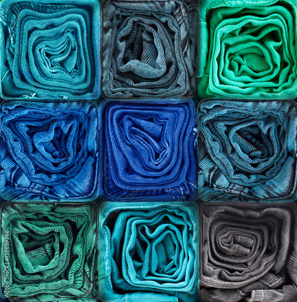 Pile of twisted jeans background