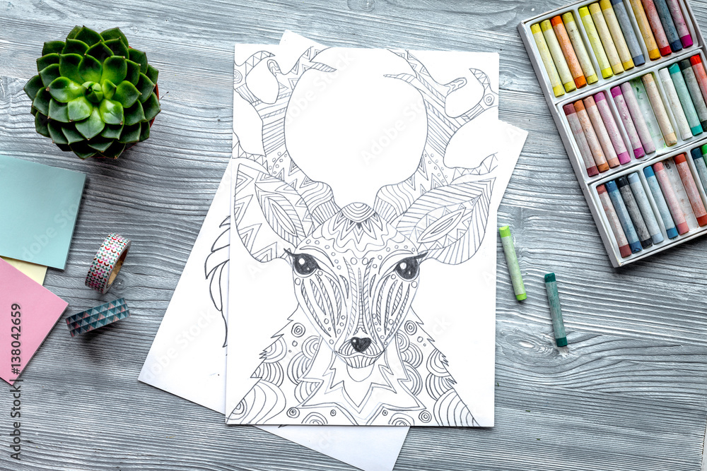 coloring picture for adults on wooden background top view