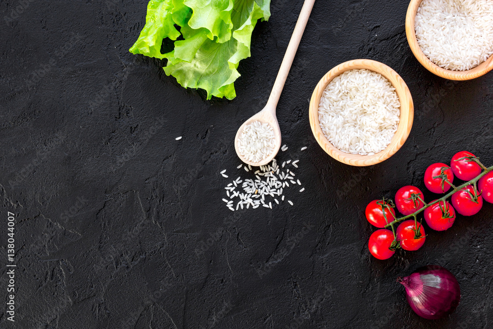 ingredients for paella on dark background top view