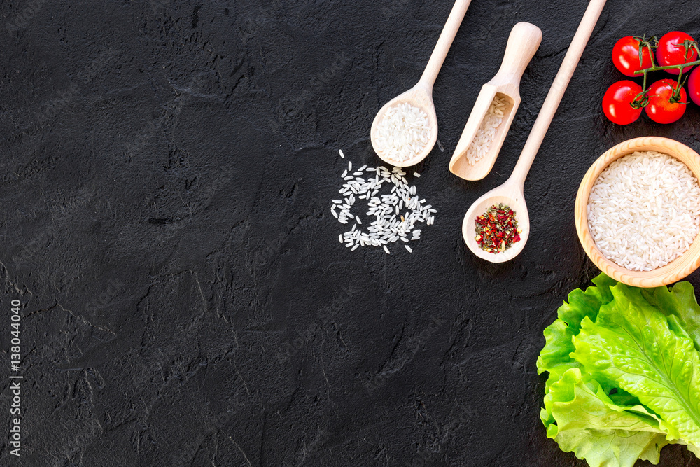 ingredients for paella on dark background top view