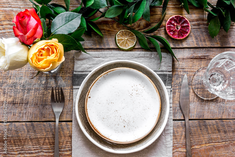 ceramic tableware top view on wooden background mock up