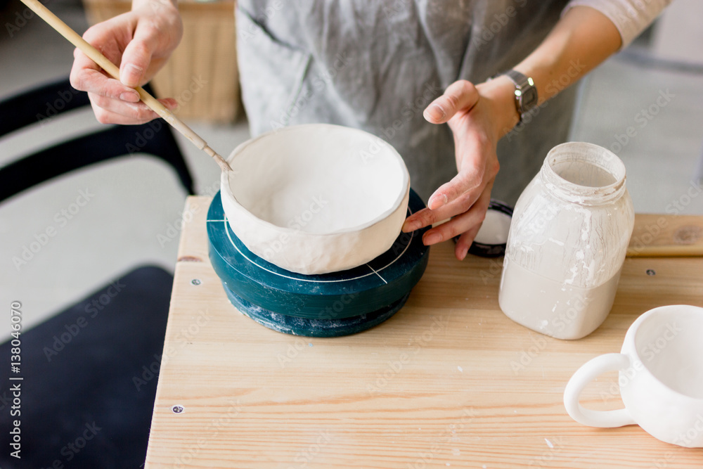 workshop production of ceramic tableware product painting