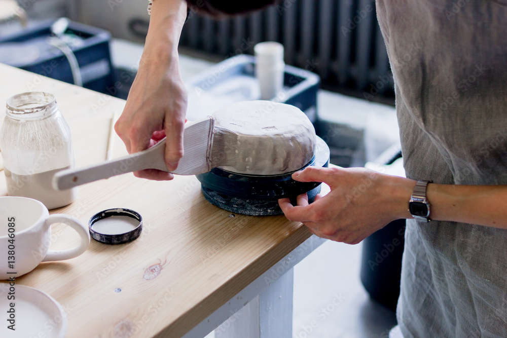 workshop production of ceramic tableware product painting