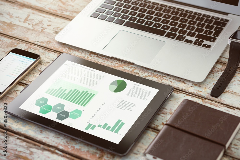 Composite image of business interface with graphs and data