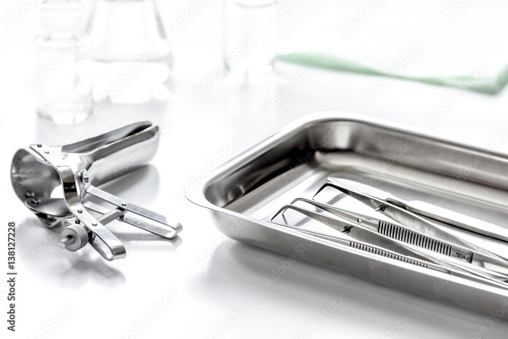 instruments of gynecologist on white background