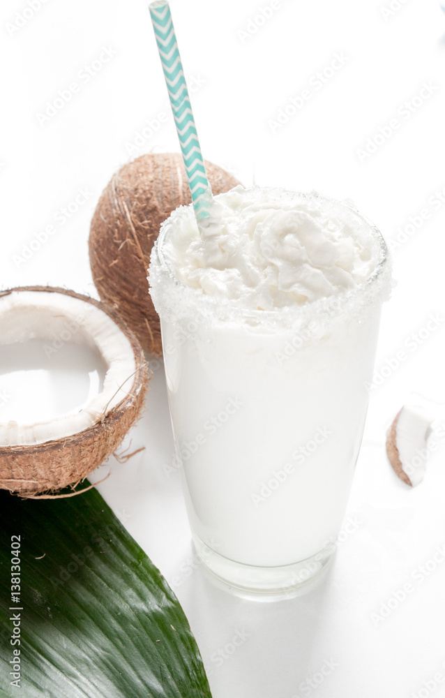 cocktail with coconut on white background