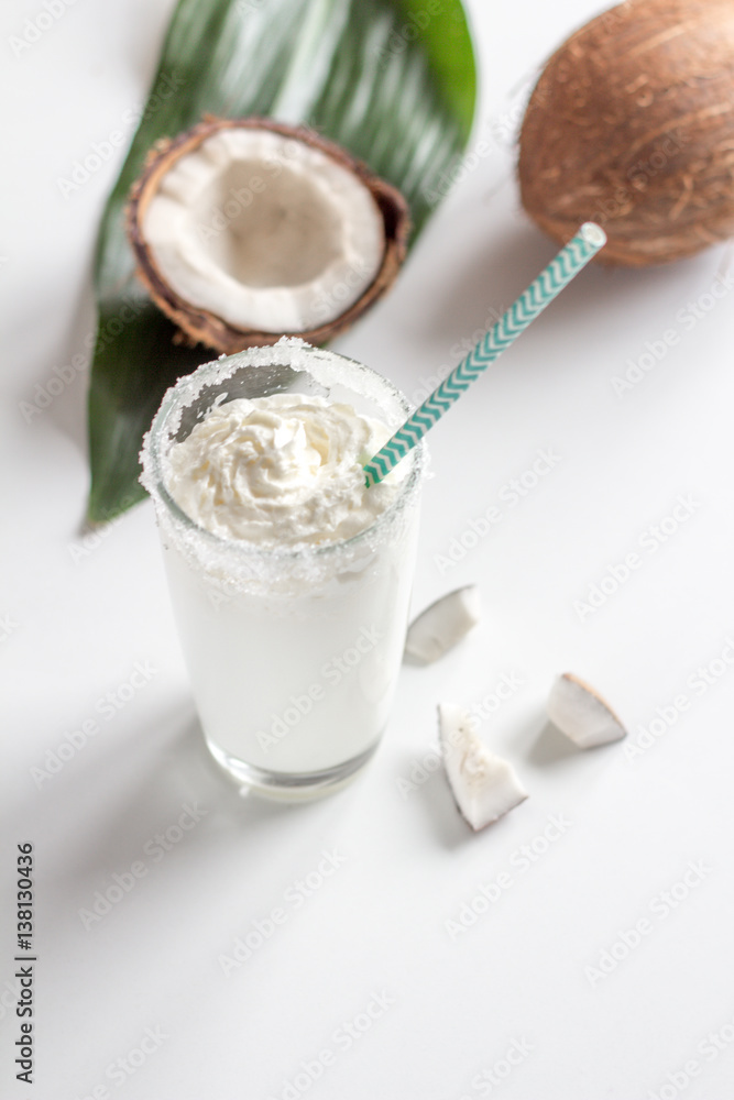 cocktail with coconut on white background