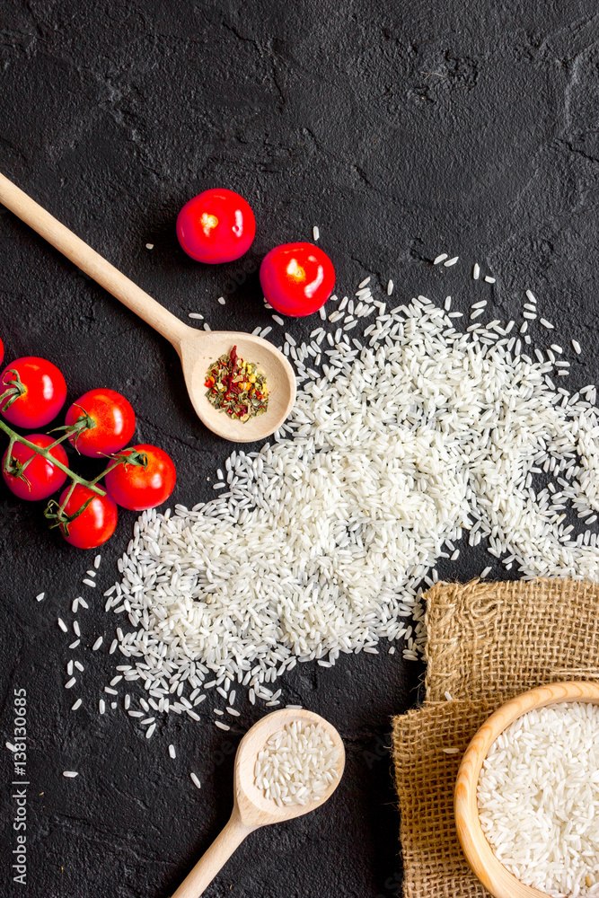 ingredients for paella on dark background top view