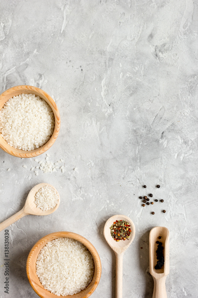 rice for paella on stone background top view mock up